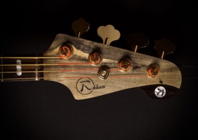 Rikkers Classicline 4-string Buckeye_Padauk_Detail